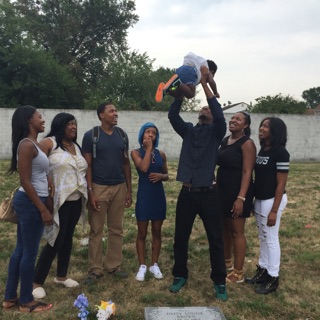 My siblings and niece, visiting our mother's grave. 